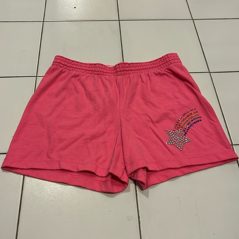 Pink sweat/pajama shorts with a rainbow shooting star made with gems